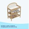 imageGraco Olivia Changing Table with WaterResistant Changing Pad Black  GREENGUARD Gold Certified Includes Bonus WaterResistant Changing Pad with Safety Strap 2 Open Shelves Stylish DesignDriftwood