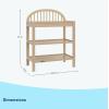 imageGraco Olivia Changing Table with WaterResistant Changing Pad Black  GREENGUARD Gold Certified Includes Bonus WaterResistant Changing Pad with Safety Strap 2 Open Shelves Stylish DesignDriftwood
