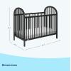 imageGraco Olivia Convertible Crib Black  GREENGUARD Gold Certified 100 Solid Wood Fits Standard Crib Mattress Converts to Toddler Bed and Daybed 4 Adjustable Mattress HeightsBlack