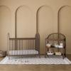 imageGraco Olivia Convertible Crib Black  GREENGUARD Gold Certified 100 Solid Wood Fits Standard Crib Mattress Converts to Toddler Bed and Daybed 4 Adjustable Mattress HeightsHazelnut