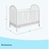 imageGraco Olivia Convertible Crib Black  GREENGUARD Gold Certified 100 Solid Wood Fits Standard Crib Mattress Converts to Toddler Bed and Daybed 4 Adjustable Mattress HeightsWhite