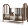 imageGraco Olivia Convertible Crib Black  GREENGUARD Gold Certified 100 Solid Wood Fits Standard Crib Mattress Converts to Toddler Bed and Daybed 4 Adjustable Mattress HeightsHazelnut