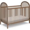 imageGraco Olivia Convertible Crib Black  GREENGUARD Gold Certified 100 Solid Wood Fits Standard Crib Mattress Converts to Toddler Bed and Daybed 4 Adjustable Mattress HeightsHazelnut