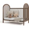 imageGraco Olivia Convertible Crib Black  GREENGUARD Gold Certified 100 Solid Wood Fits Standard Crib Mattress Converts to Toddler Bed and Daybed 4 Adjustable Mattress HeightsHazelnut