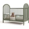 imageGraco Olivia Convertible Crib Black  GREENGUARD Gold Certified 100 Solid Wood Fits Standard Crib Mattress Converts to Toddler Bed and Daybed 4 Adjustable Mattress HeightsOlive