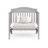imageGraco Stella 4in1 Convertible Mini Crib with Bonus Mattress Pebble Gray  Includes Bonus 275 Inch Thick Mattress with WaterResistant Cover Converts to Twin Bed Ideal Crib for Small SpacesPebble Gray