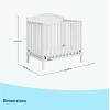 imageGraco Stella 4in1 Convertible Mini Crib with Bonus Mattress Pebble Gray  Includes Bonus 275 Inch Thick Mattress with WaterResistant Cover Converts to Twin Bed Ideal Crib for Small SpacesWhite
