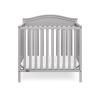 imageGraco Stella 4in1 Convertible Mini Crib with Bonus Mattress Pebble Gray  Includes Bonus 275 Inch Thick Mattress with WaterResistant Cover Converts to Twin Bed Ideal Crib for Small SpacesPebble Gray