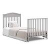 imageGraco Stella 4in1 Convertible Mini Crib with Bonus Mattress Pebble Gray  Includes Bonus 275 Inch Thick Mattress with WaterResistant Cover Converts to Twin Bed Ideal Crib for Small SpacesPebble Gray