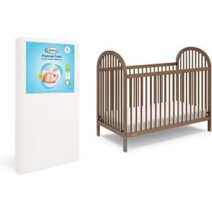 imageGraco Olivia Convertible Crib Black  GREENGUARD Gold Certified 100 Solid Wood Fits Standard Crib Mattress Converts to Toddler Bed and Daybed 4 Adjustable Mattress HeightsHazelnut