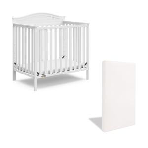 imageGraco Stella 4in1 Convertible Mini Crib with Bonus Mattress Pebble Gray  Includes Bonus 275 Inch Thick Mattress with WaterResistant Cover Converts to Twin Bed Ideal Crib for Small SpacesWhite