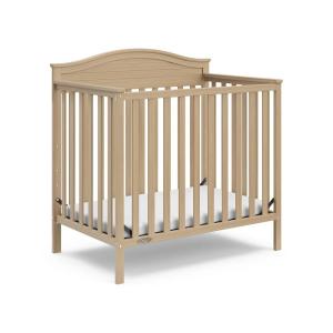 imageGraco Stella 4in1 Convertible Mini Crib with Bonus Mattress Pebble Gray  Includes Bonus 275 Inch Thick Mattress with WaterResistant Cover Converts to Twin Bed Ideal Crib for Small SpacesDriftwood