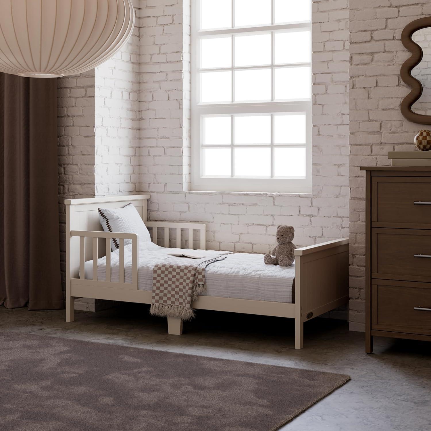 imageGraco Bailey Toddler Bed Pebble Gray  GREENGUARD Gold Certified Fits Standard FullSize Crib ampamp Toddler Mattress Toddler Safety Guardrails Included Complete Design with Solid Headboard FootboardFrosted Oat