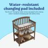 imageGraco Changing Table with WaterResistant Changing Pad White  GREENGUARD Gold Certified Multi Storage Nursery Changing Table for Infants and BabiesHazelnut