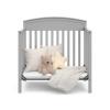 imageGraco Benton 4in1 Convertible Mini Crib with Bonus Crib Mattress White  GREENGUARD Gold Certified 275Inch Mattress Included Baby Crib Converts to Twin Bed Ideal for Small SpacesPebble Gray