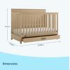 imageGraco Tristan 5in1 Convertible Crib with Drawer Frosted Oat  GREENGUARD Gold Certified Fits Standard Crib Mattress Premium Handle Converts to Toddler Bed Daybed and FullSize BedDriftwood