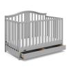 imageGraco Solano 4in1 Convertible Crib with Drawer Pebble Gray  GREENGUARD Gold Certified Includes FullSize Nursery Storage DrawerPebble Gray